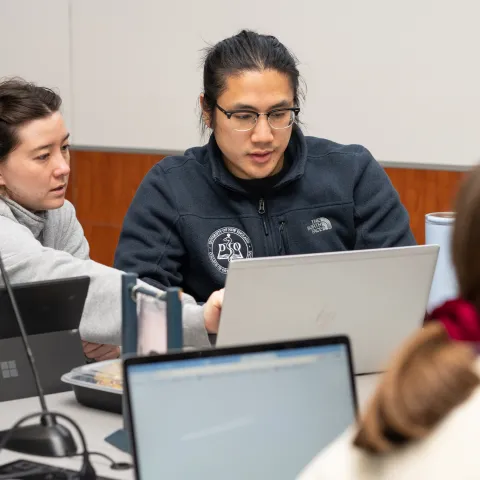 UNE COM students study in groups in Leonard Hall