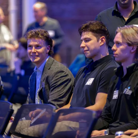 UNE students watch a panel discussion in Innovation Hall