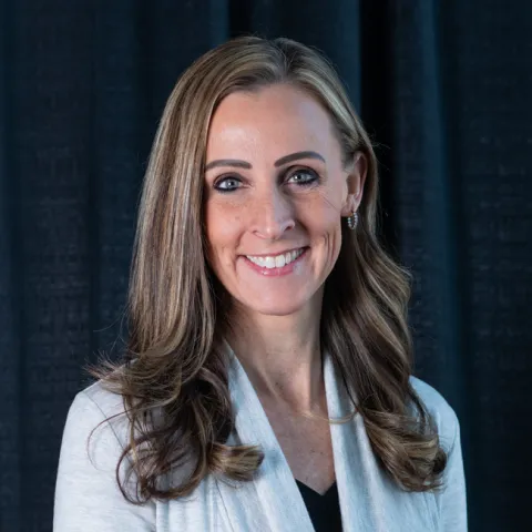 Headshot of U N E employee Jamie Harmon